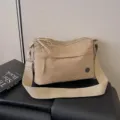 Casual nylon shoulder bag for women, multi-layer commuter crossbody bag in khaki. - Khaki
