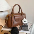 Brown PU leather top handle shoulder bag with cute plush keychain charm for women everyday use - With Pendant / Brown
