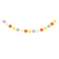 Detail view of colorful felt pom pom garland for Easter party decor, hanging vibrant balls. - Four-Color Pom Pom Garland