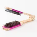 V-shaped hair straightening brush with wood grain handle and pink metal accents for styling. - Pink