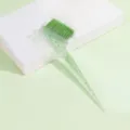 Transparent green glitter hair dyeing brush featuring soft bristles and pointed tail design. - Dyeing Comb Brush / Single Piece / Green