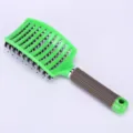 Green curved hair brush with boar bristles and brown textured handle for smooth styling. - OPP Bag / Green With Bristles