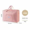 Large pink foldable travel duffel bag with shoulder handles and front pocket storage. - L / Pink