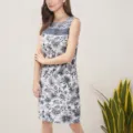 Blue and white floral print sleeveless dress featuring elegant crochet yoke and stylish cut. - S / Black and White