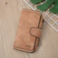 Long women's matte PU leather wallet with snap closure, zipper pocket, and stylish brown design. - Brown