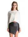 Detailed view of women's white hollow-out knit sweater and black PU leather mini skirt. - XL / Bottoms / Black