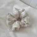 Detailed view of floral hair scrunchie, soft fabric with pink flower pattern texture. - Style 5 Floral