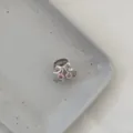 Close-up detail of a cute mini hair claw clip featuring a silver bow and pink rhinestone cherry. - Pink Bowknot - Gray Claw