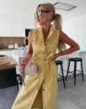 Women's sleeveless belted denim dress, yellow single-breasted utility midi dress. - Earthy Yellow