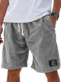 Men's casual linen shorts featuring elastic drawstring waist and stylish black patch detail. - S / Gray