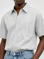Men washed cotton short sleeve shirt with chest pocket and button closure detail view - S / White