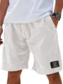 Pantalones cortos de lino para hombre verano sueltos playa casual con cordón y etiqueta negra. - 3XL / Blanco Grisáceo
