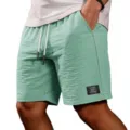 Men's casual mint green drawstring shorts, loose solid color beach shorts with pocket details. - S / Light Green