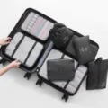 Travel packing cubes set, 8-piece luggage organizer bags in black, ideal for suitcase storage. - New 8-Piece Set / Black