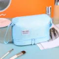 Borsa da toeletta da viaggio a doppio strato blu chiaro custodia per trucchi portatile. - Celeste