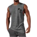 Close-up detail of grey sleeveless muscle tank top featuring a black palm tree chest print. - S / Tops / Light Gray