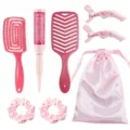 Pink hair brush set with styling combs, hair clips, scrunchies, and storage pouch for women. - Pink