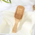 Natural bamboo air cushion hair massage brush with flexible pins for daily care and styling. - S