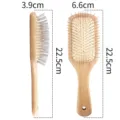 Natural bamboo wooden paddle hair brush with steel massage pins and air cushion design. - S