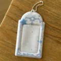 Cute 3-inch photocard holder with celestial blue frame and ball chain for idol cards. - First Snow Love Card Holder