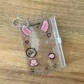 Transparent PVC 3-inch photocard holder bag with cute rabbit ears and white ball chain. - Pink Rabbit Themed Zipper Bags