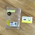 Clear sparkly PVC candy pouch keychain for photocards and badges, cute mart receipt design. - Yellow