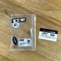 Transparent glitter PVC zipper pouch detail, perfect for storing 3-inch idol photocards. - Black
