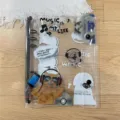 Transparent A5 6-ring binder photo card album featuring cute cat designs and music details. - Headphone Cat Shell / Clear
