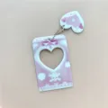 Pink cute dark style 3-inch photocard holder with heart cutout and skull charm for idol cards. - Pink Skull Card Sleeves