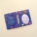 Detailed view of the cute purple mini photocard album with oval hollow design and sweet bear graphics. - 3-Inch Starry Yellow Bear Photo Album (40 Pockets)