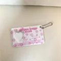 Pink acrylic photocard holder keychain with heart cutout and cute English text design. - Pink Heart Card Sleeves / 1 Inch