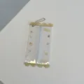 Detalle de bolsa de muñeca de PVC transparente, lindo estuche claro con cadena y estampados. - Bolsa de muñeca de caramelo amarilla