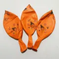 Orange latex balloons featuring cool basketball and flame prints, perfect for kids party decor. - Basketball