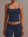 Close-up detail of women's dark blue square neck cropped camisole top and matching leggings. - XS / Burgundy