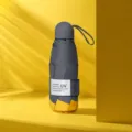 Gembergekleurde 5-voudige mini zakparaplu, UV-bescherming zwarte coating zon- en regenparaplu. - 6 Ribben / Gembergeel