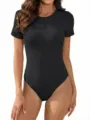 Detailed view of the black ribbed short-sleeve bodysuit, slim fit crew neck design. - 2XL / Tops / Black