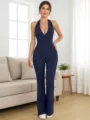 Dark blue halter deep V-neck fitted flare jumpsuit, detailed view showcasing slim fit. - XS / Top And Bottom / Burgundy