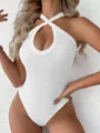 White cross halter bodysuit detail view, ribbed knit fabric, slim fit summer top. - L / Tops / White