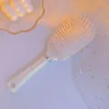 Bonito cepillo de masaje para el cabello con cojin de aire, cepillo antiestatico blanco. - Ovalado / Champán dorado