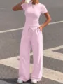 Pink casual two-piece set featuring a ribbed short-sleeve top and matching drawstring pants. - XS / Top And Bottom / Pink