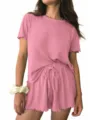 Women ribbed knit pajama set with short sleeve top and drawstring shorts detail view. - Leather Pink