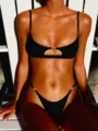 Stylish black two-piece bikini featuring cutout bust design and luxury gold hardware details. - S / Black