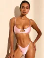 Close-up detail of the pink metallic ring cutout bikini front and delicate thin straps. - S / Pink