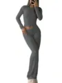 Detail view of the dark grey two-piece casual workout set featuring a long-sleeve crop top. - XS / Top And Bottom / Dark Gray