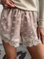Close-up of satin lace trim shorts detail, featuring cute pink heart print design. - S / Bottoms / Light Pink (Heart Shape)