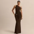 Detailed view of elegant brown one-shoulder evening dress with metallic ring decoration. - XS / Dresses / Brown