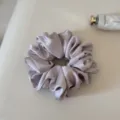 Elegant purple satin hair scrunchie, soft elastic ponytail holder for daily styling and hair care. - Purple