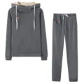 Detailed view of grey fleece hooded sweatshirt and sweatpants casual sportswear set. - Dark Gray