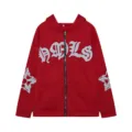 Detailed view of red zip-up hoodie featuring gothic chest letters and sleeve cross graphics. - S / Red