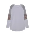 Detailed view of women's long sleeve t-shirt with striped and leopard colorblock sleeves. - S / Tops / White